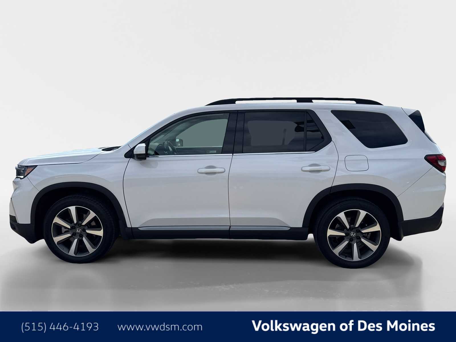 View vehicle photo 3