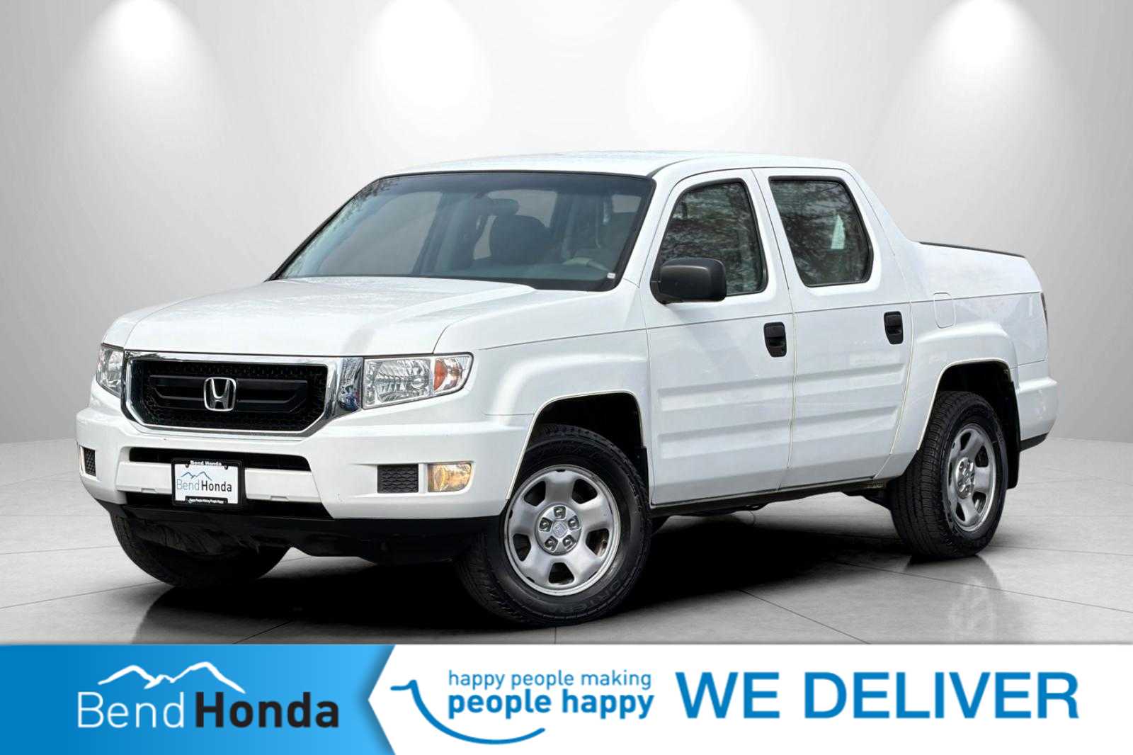 White 2010 Honda Ridgeline RT Pickup Truck Four-Wheel Drive 5-Speed Automatic