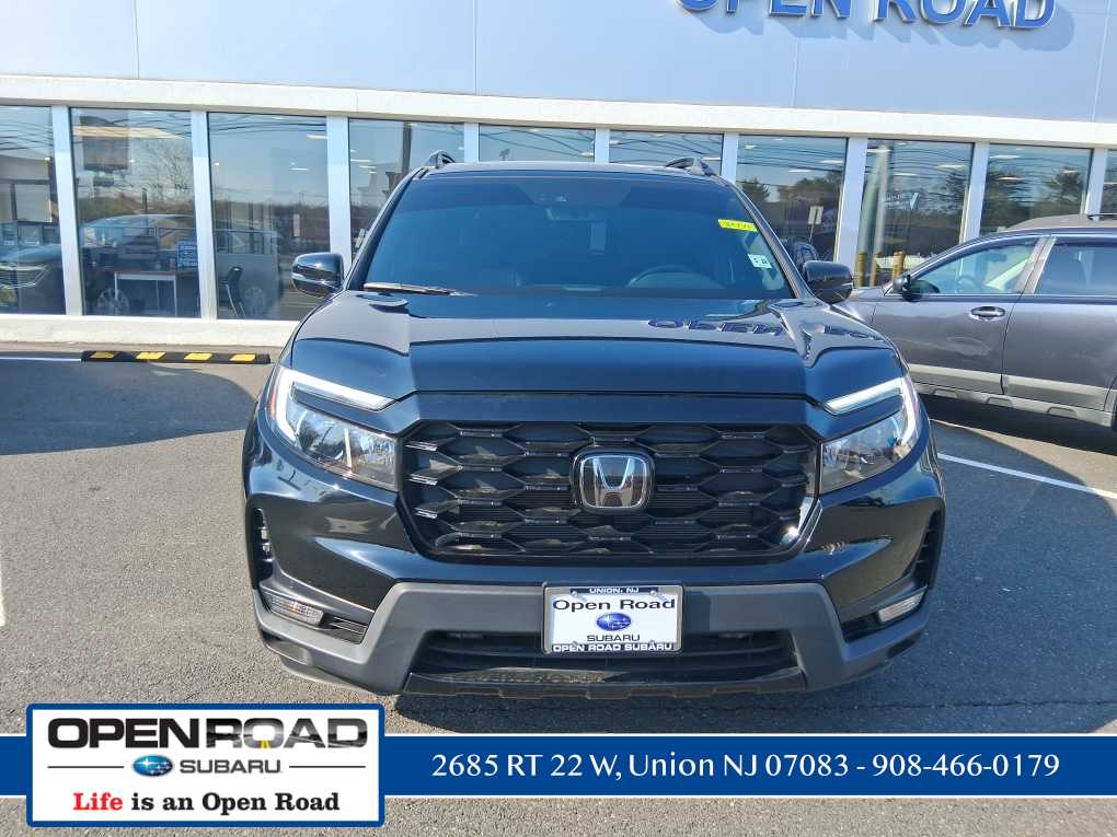 View vehicle photo 2