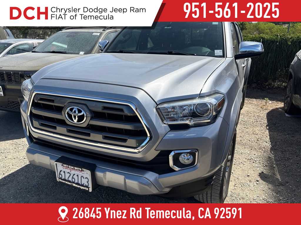 Silver Sky Metallic 2016 Toyota Tacoma Pickup Truck Four-Wheel Drive 6-Speed Automatic