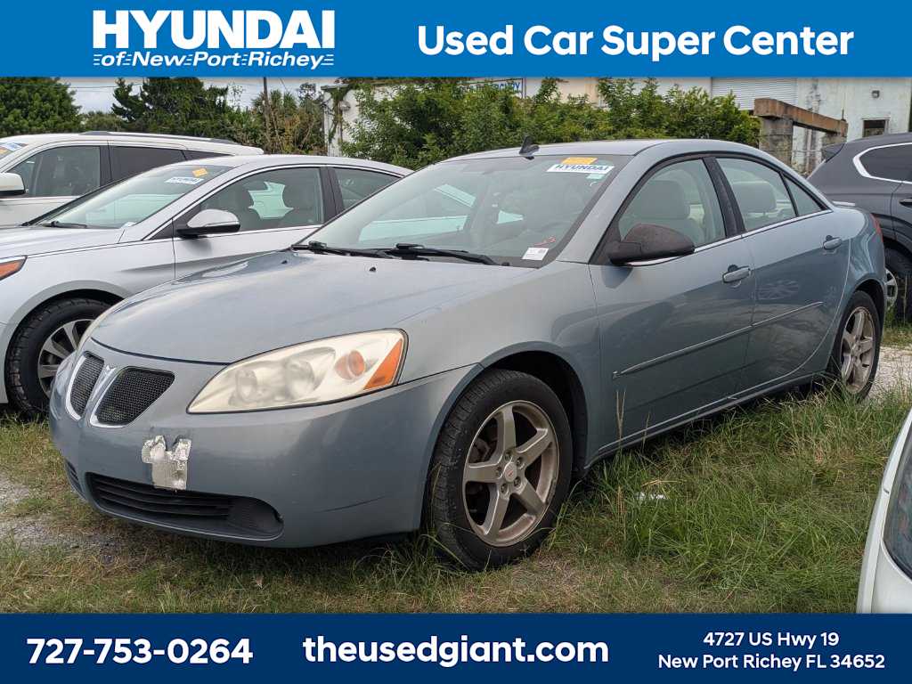 Blue-Gold Crystal Metallic 2009 Pontiac G6 Sedan Front-Wheel Drive 4-Speed Automatic