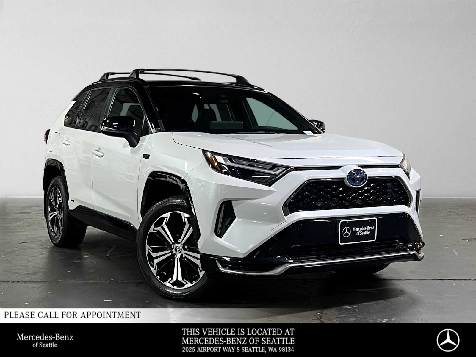 Wind Chill Pearl/Midnight Black Metallic 2024 Toyota RAV4 Prime SUV / Crossover All-Wheel Drive Continuously Variable Transmission