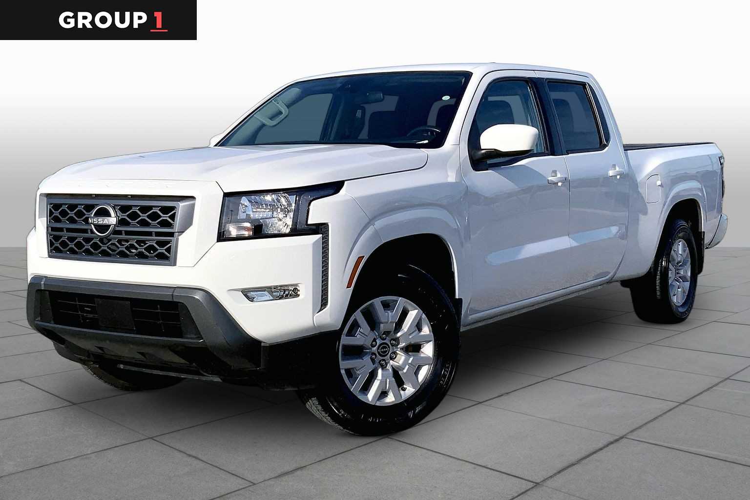 2023 Nissan Frontier SV Glacier White at Sterling McCall Nissan