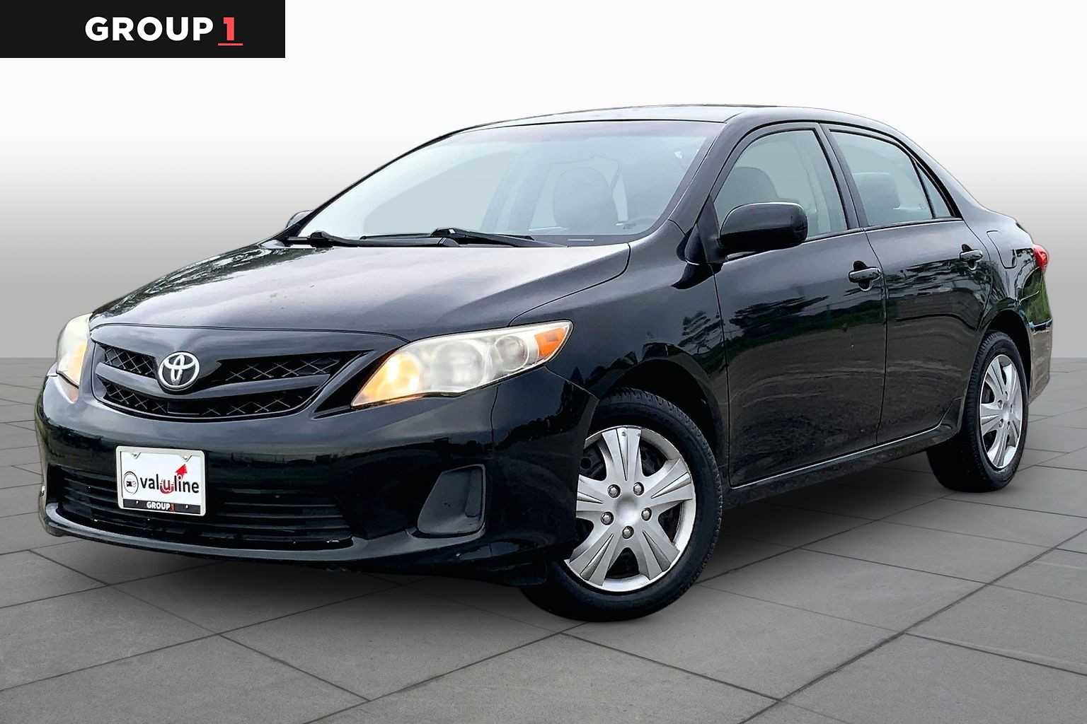 2012 Toyota Corolla LE Black Sand Pearl at Sterling McCall Nissan