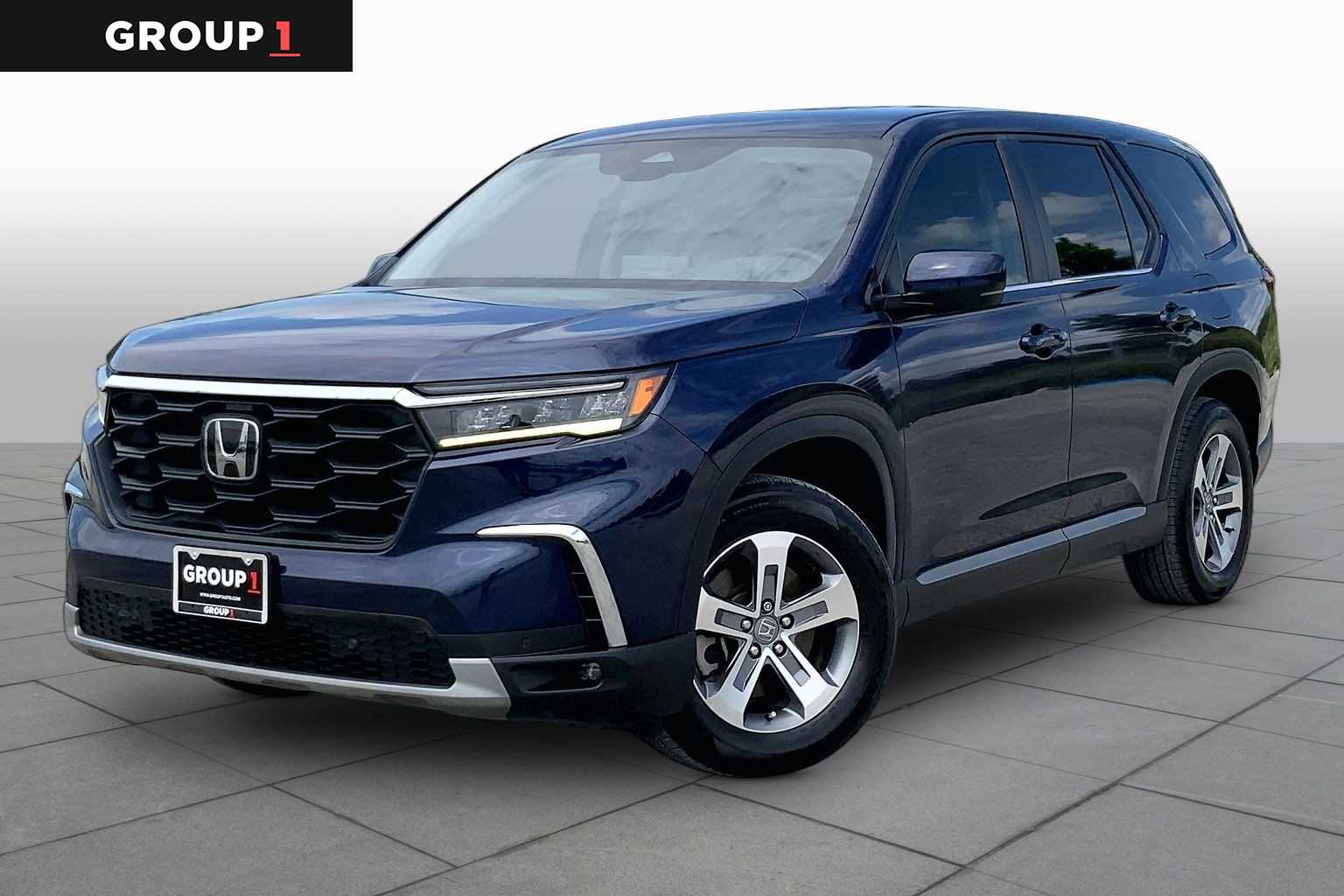 2024 Honda Pilot EX-L 8 Passenger Obsidian Blue Pearl at Tomball Ford