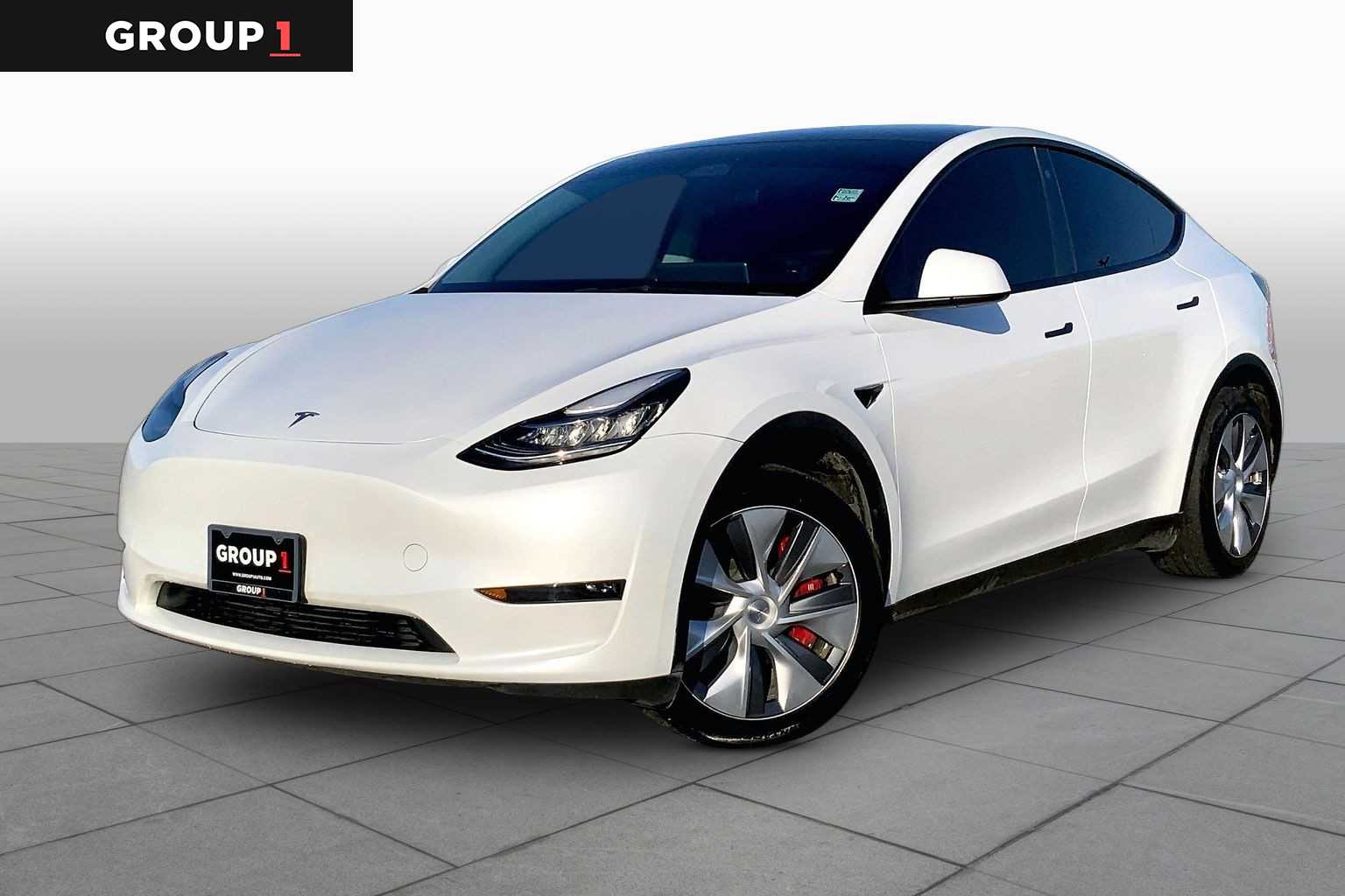 2023 Tesla Model Y Long Range Pearl White Multi-Coat at Westside Kia