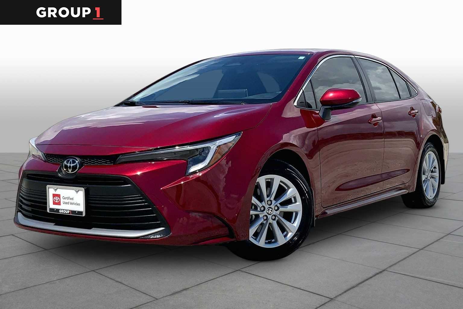 2026 Toyota Corolla Hybrid XLE Ruby Flare Pearl at Team Toyota