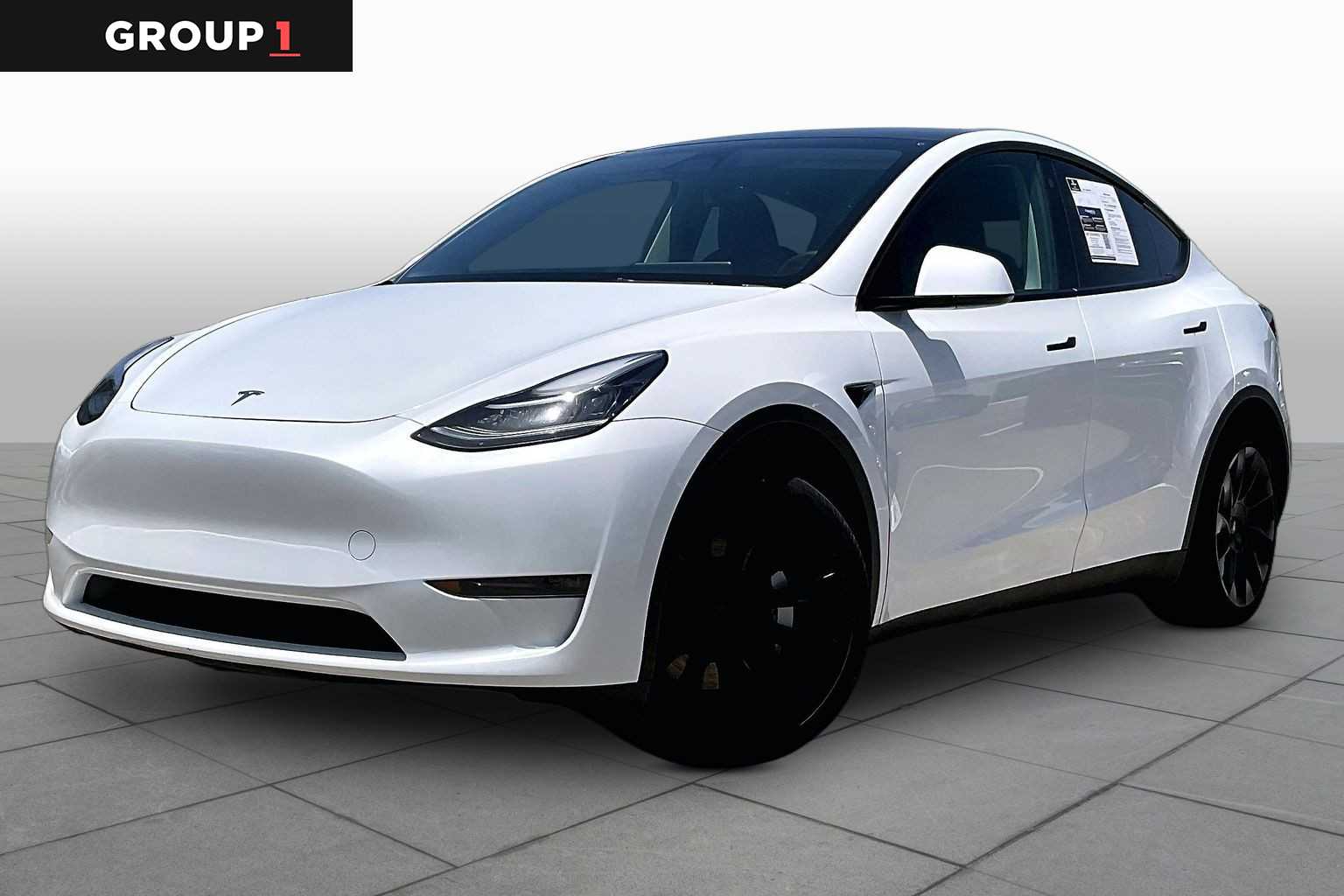 2023 Tesla Model Y  Pearl White Multi-Coat at Lexus Southwest Houston