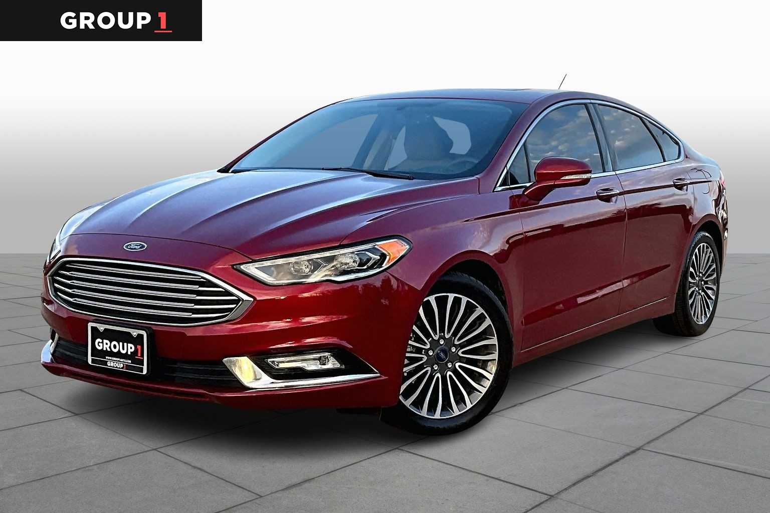 2017 Ford Fusion SE Ruby Red Metallic Tinted Clearcoat at HGreg Houston