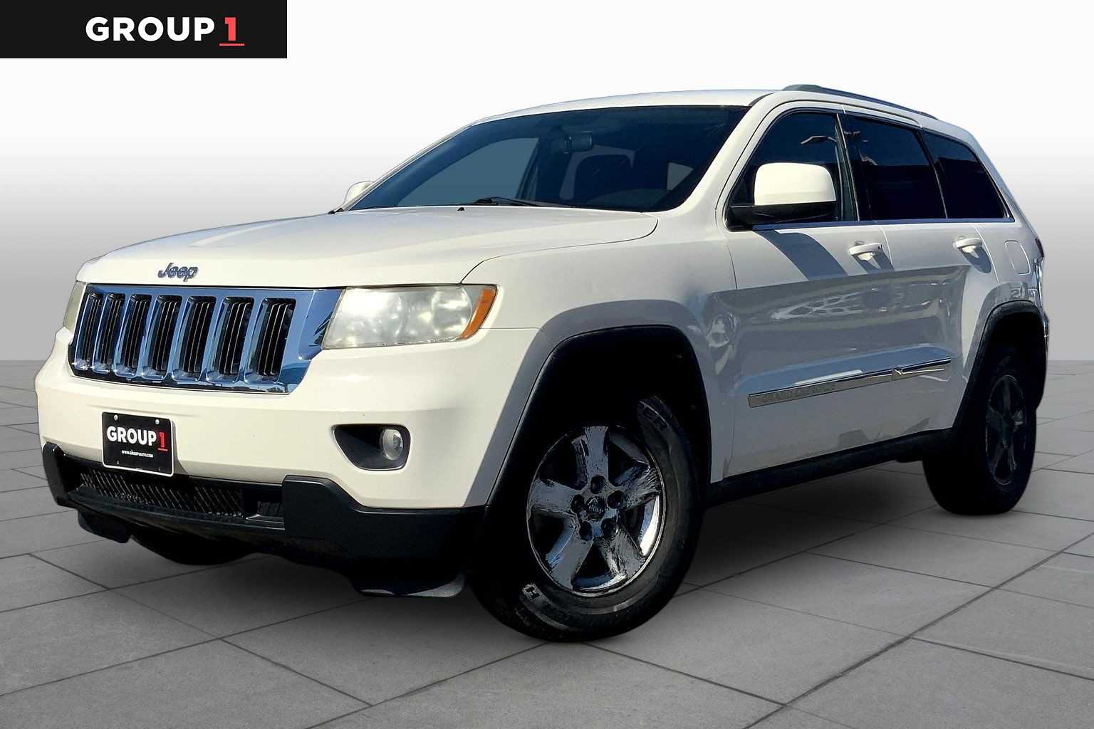 Stone White 2011 Jeep Grand Cherokee Laredo 4WD SUV / Crossover Four-Wheel Drive 5-Speed Automatic
