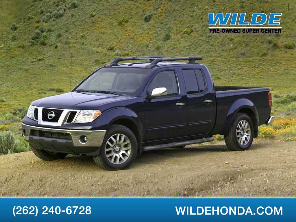 Brilliant Silver 2012 Nissan Frontier SL Crew Cab 4WD Pickup Truck Four-Wheel Drive Automatic