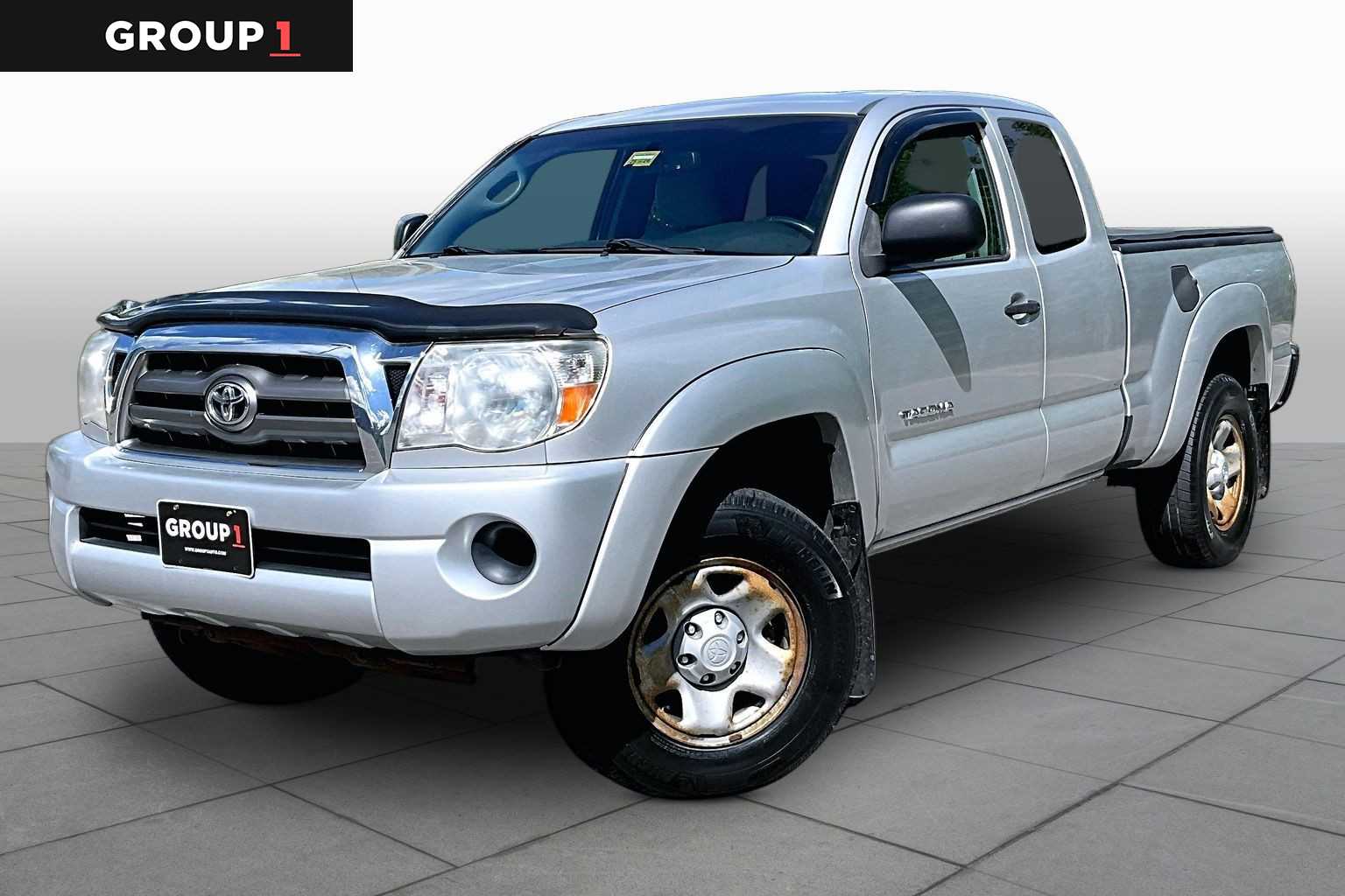 Silver Streak Mica 2010 Toyota Tacoma Access Cab 4WD Pickup Truck Four-Wheel Drive 5-Speed Manual