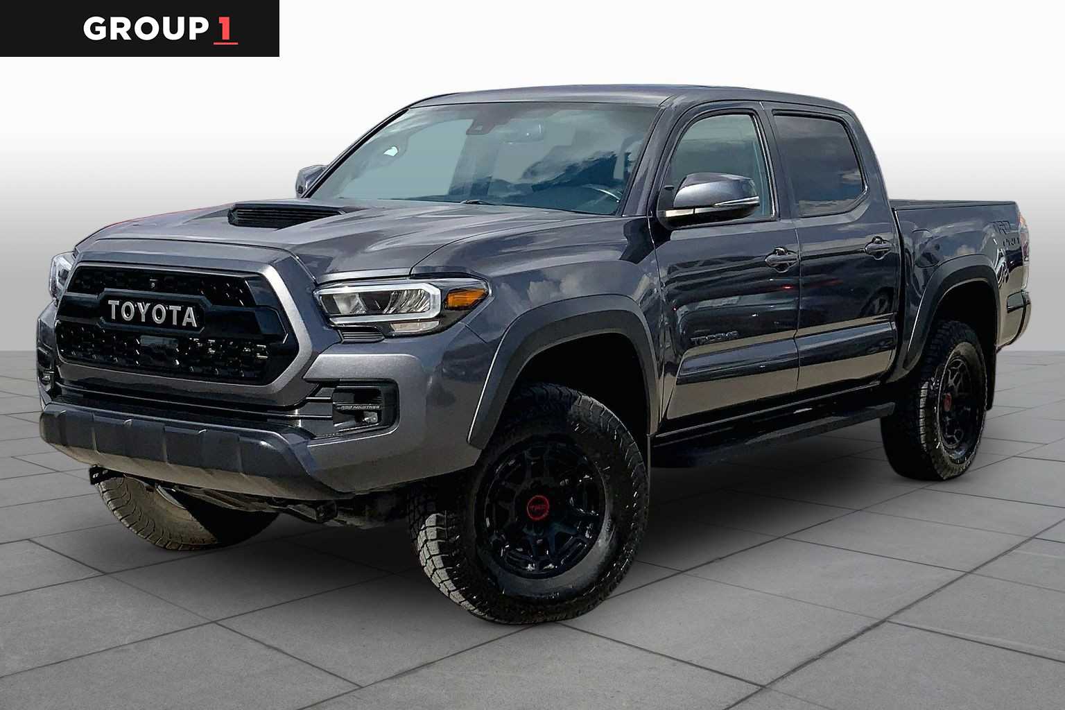 Magnetic Gray Metallic 2023 Toyota Tacoma Pickup Truck Four-Wheel Drive Manual
