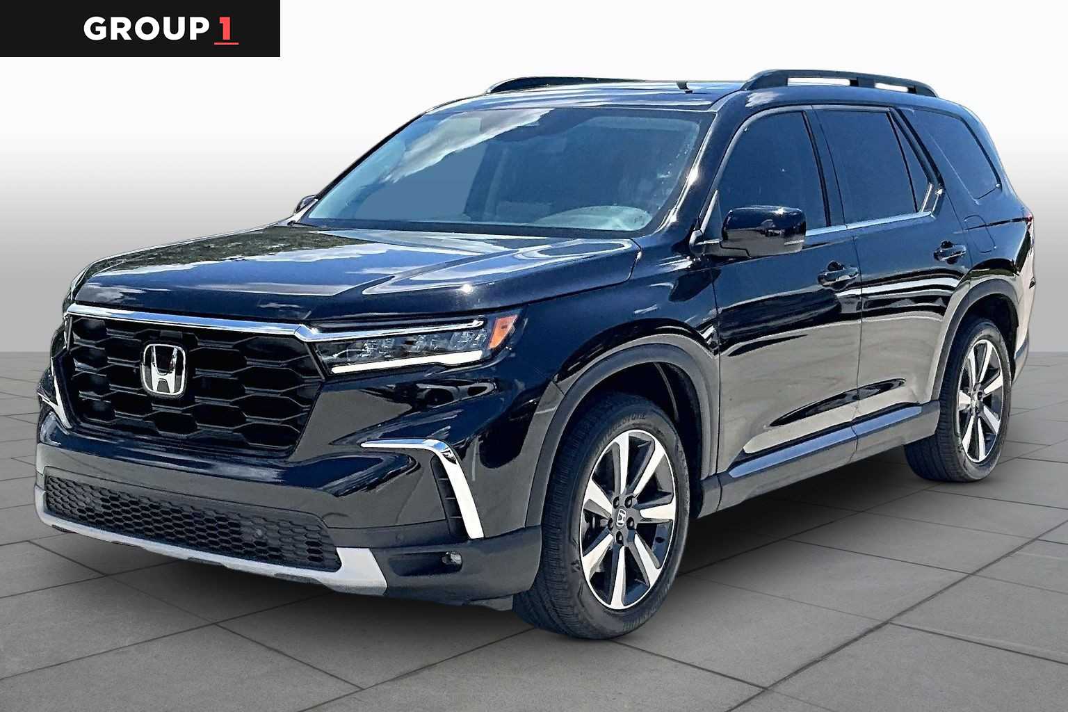 2024 Honda Pilot Touring Crystal Black Pearl at Tomball Ford