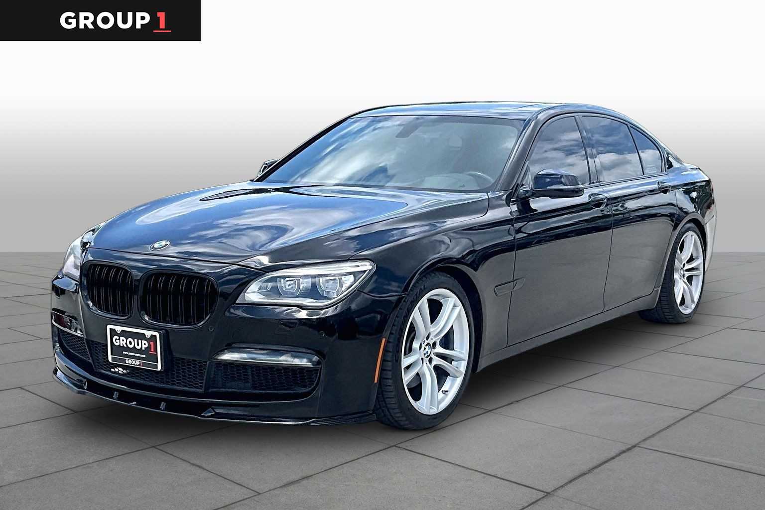 2013 BMW 740i 740i Black Sapphire Metallic at Tomball Ford