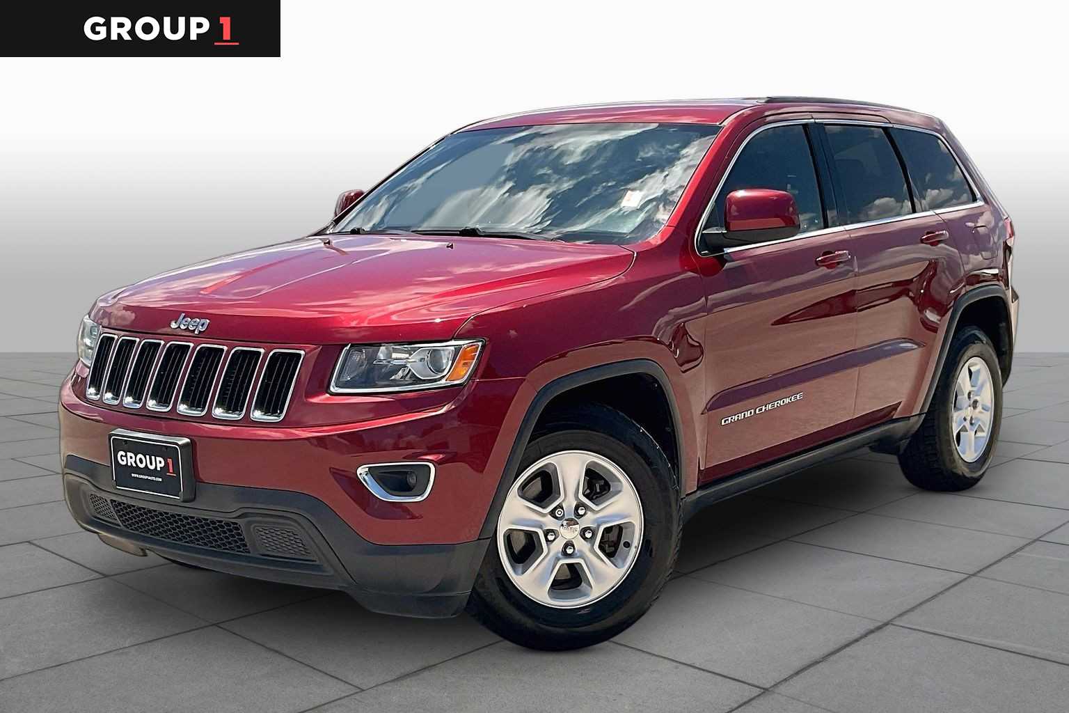 2014 Jeep Grand Cherokee Laredo Deep Cherry Red Crystal Pearlcoat at Sterling McCall Nissan