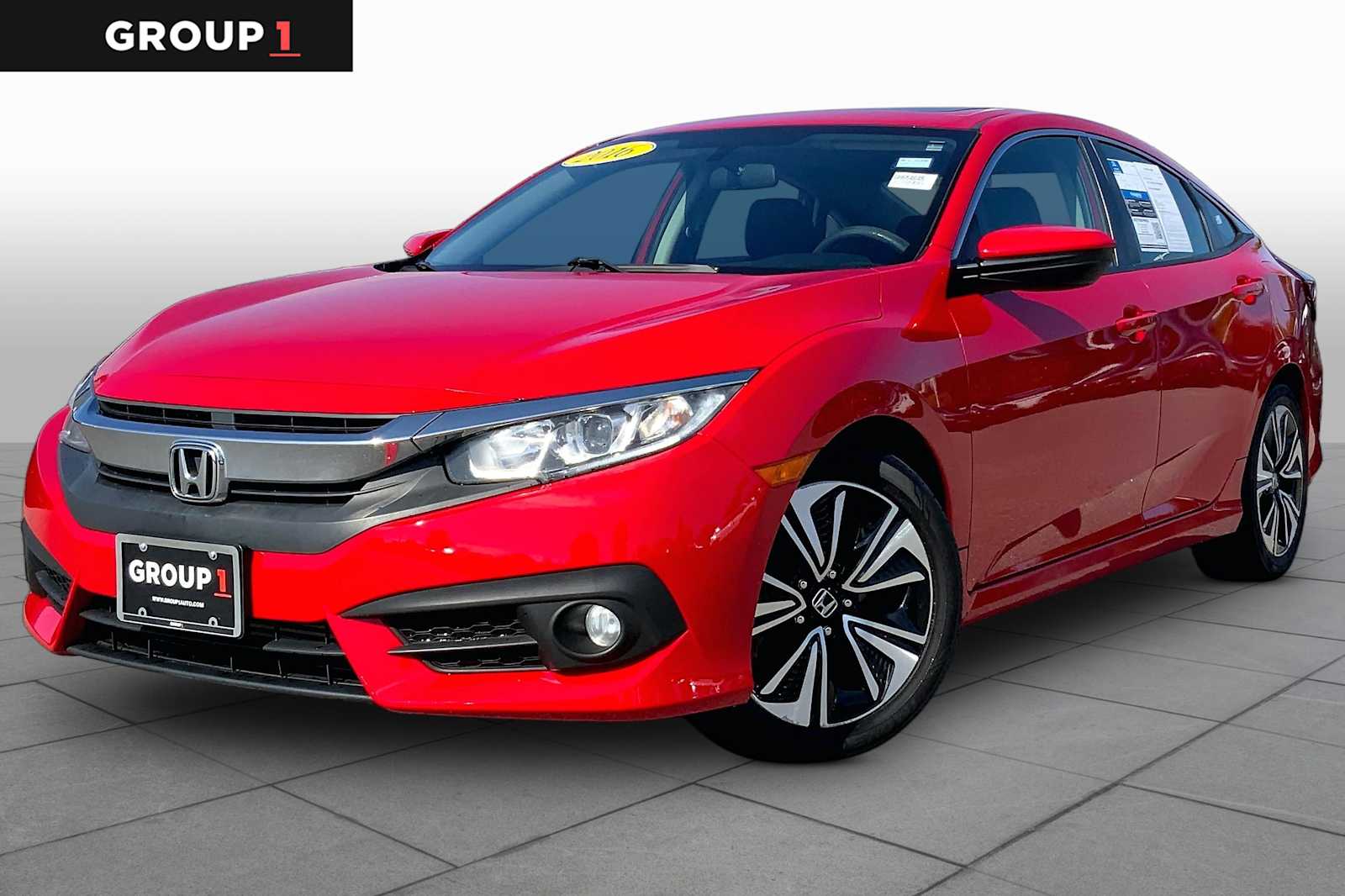 Rallye Red 2016 Honda Civic Sedan Front-Wheel Drive Continuously Variable Transmission