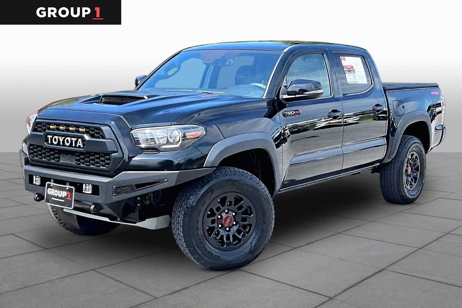 Midnight Black Metallic 2018 Toyota Tacoma Pickup Truck Four-Wheel Drive Automatic