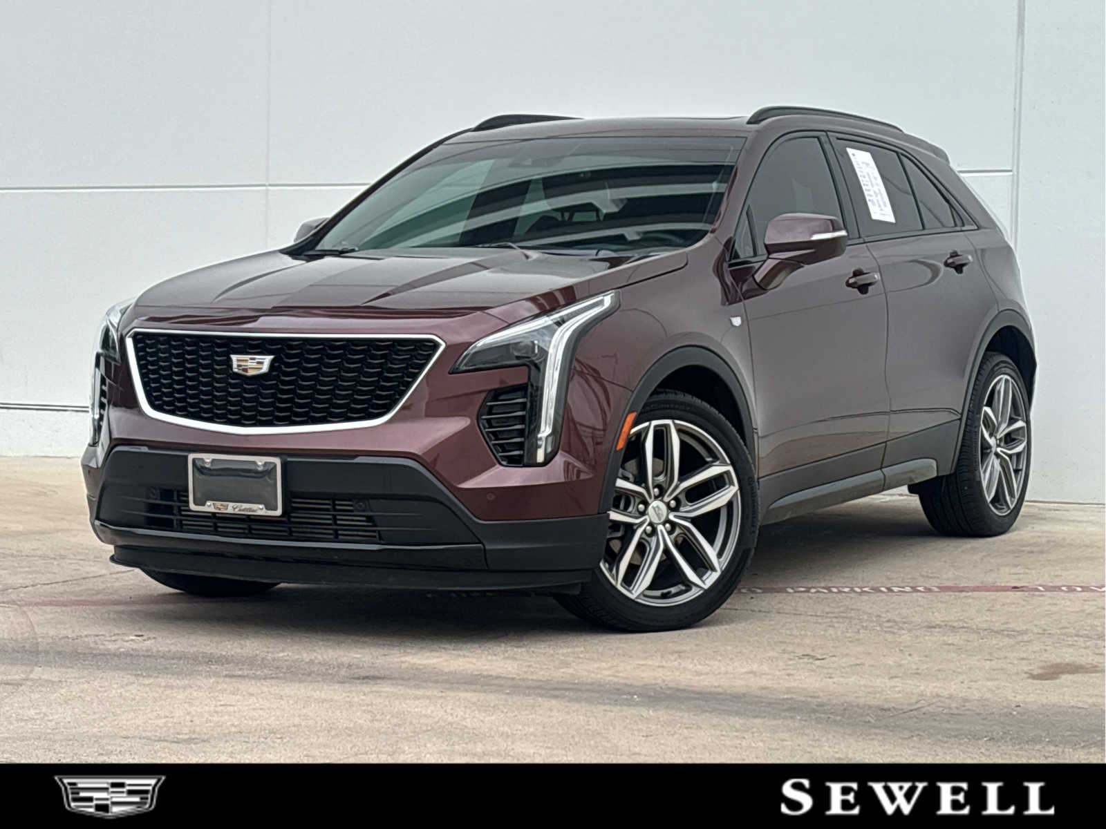 レアデック　Madison Advocates(Black/SCARLET) Certified Pre-Owned 2022 Cadillac XT4 FWD Sport Sport Utility in