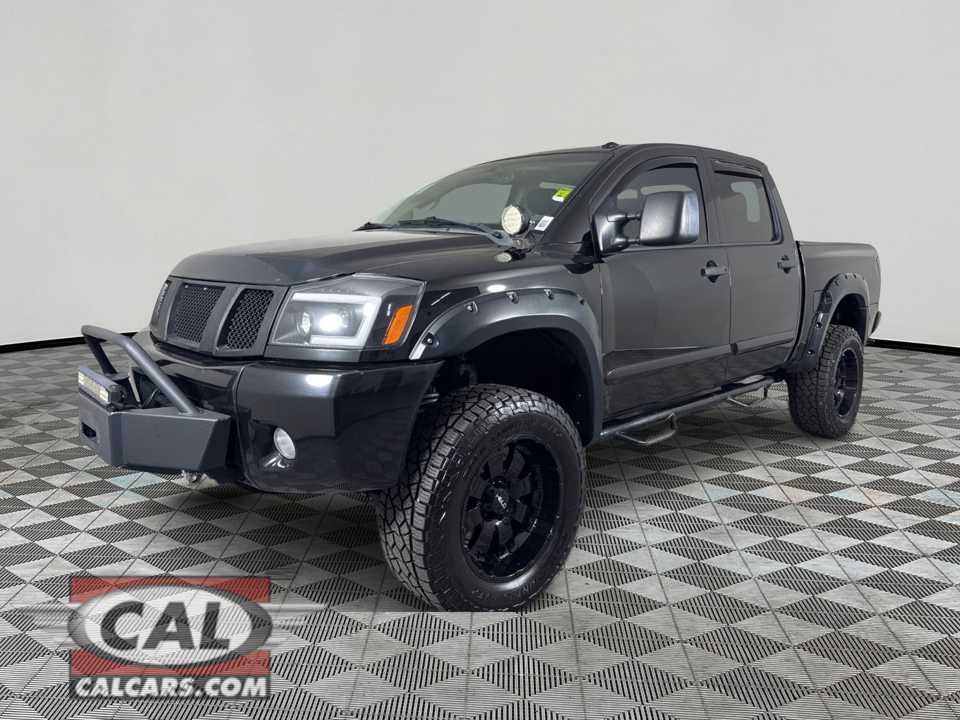 Black 2014 Nissan Titan SL Crew Cab 4WD Pickup Truck Four-Wheel Drive 5-Speed Automatic