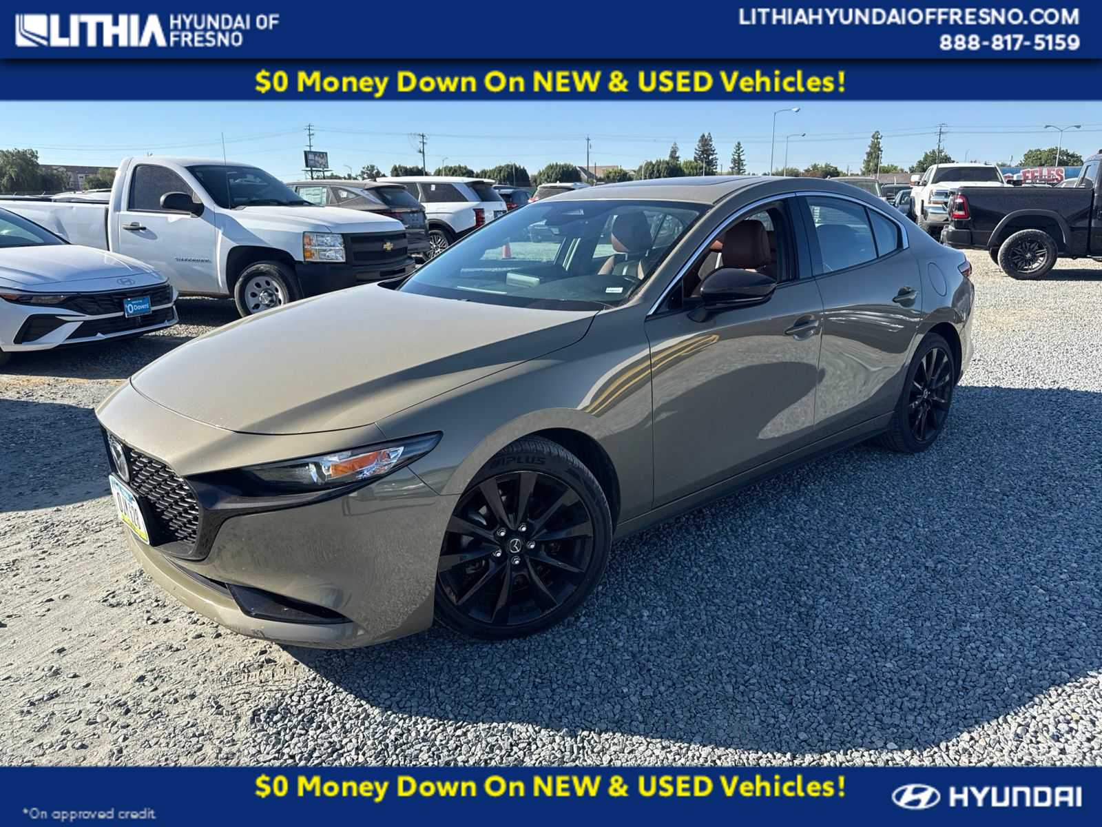 Zircon Sand Metallic 2024 Mazda MAZDA3 Sedan All-Wheel Drive 6-Speed Automatic