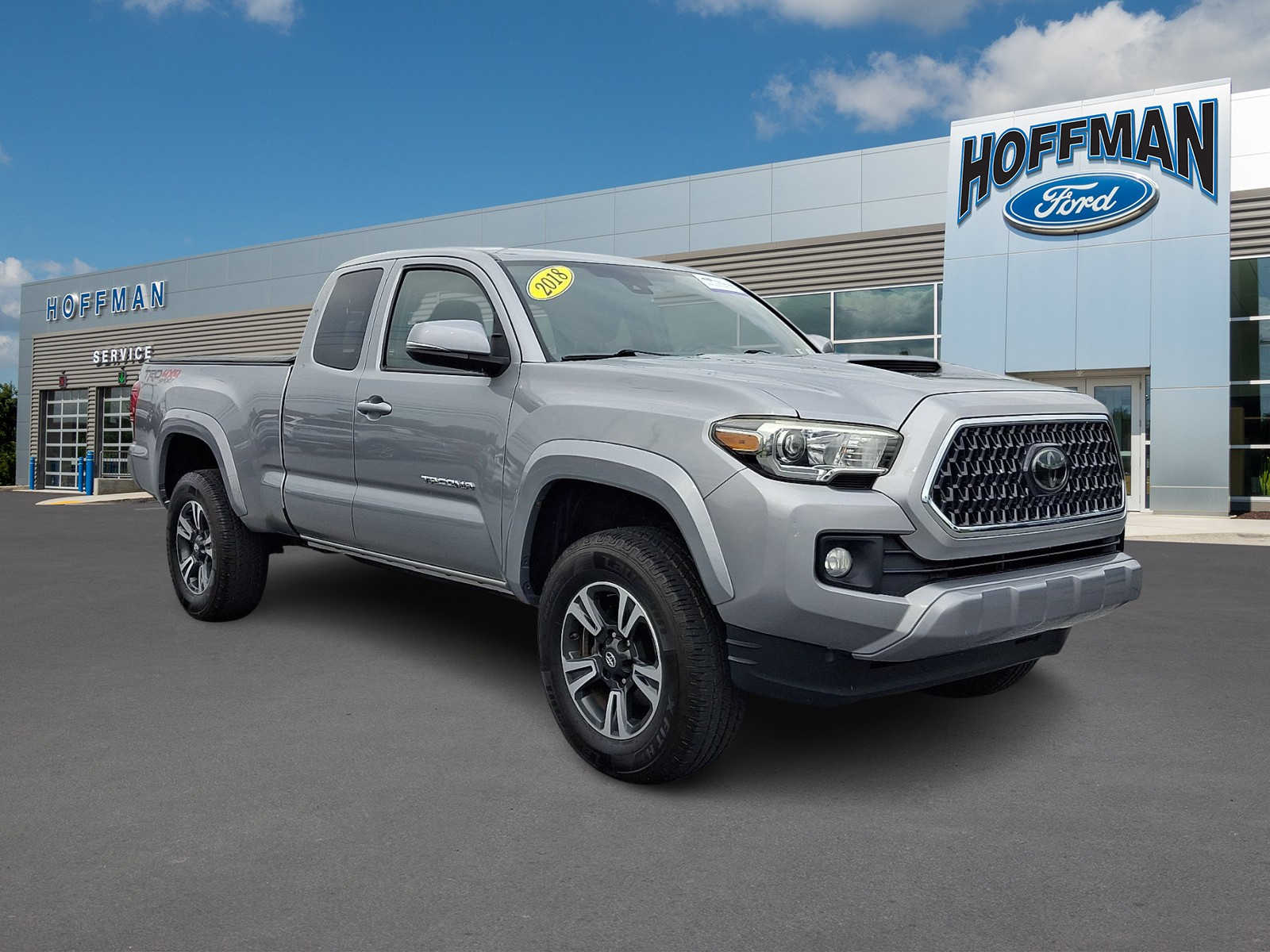 Silver Sky Metallic 2018 Toyota Tacoma Pickup Truck Four-Wheel Drive 6-Speed Manual