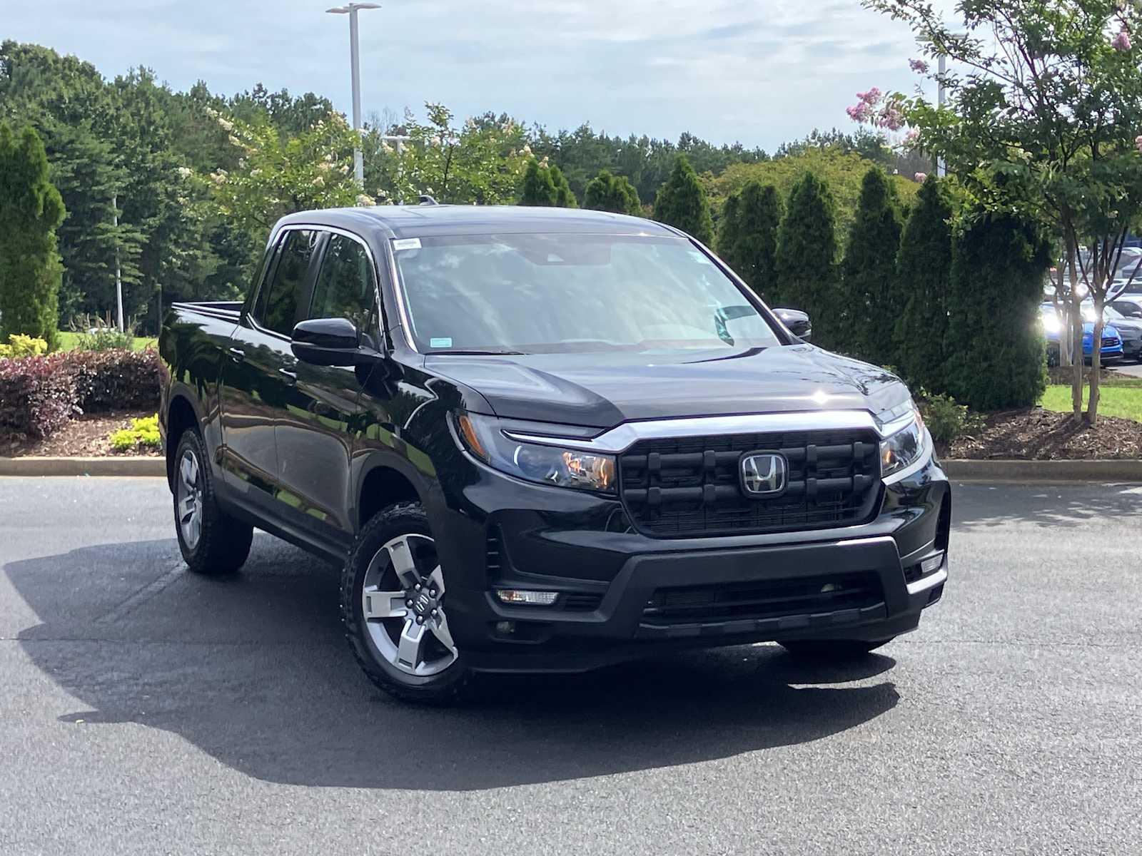 Crystal Black Pearl 2025 Honda Ridgeline Pickup Truck All-Wheel Drive 9-Speed Automatic