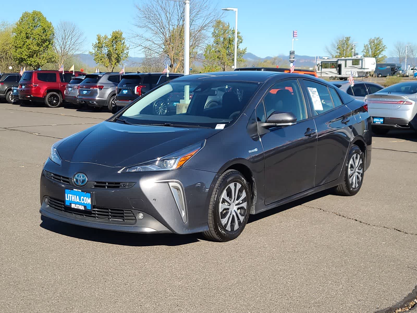 Magnetic Gray Metallic 2022 Toyota Prius LE AWD-e Hatchback All-Wheel Drive Continuously Variable Transmission