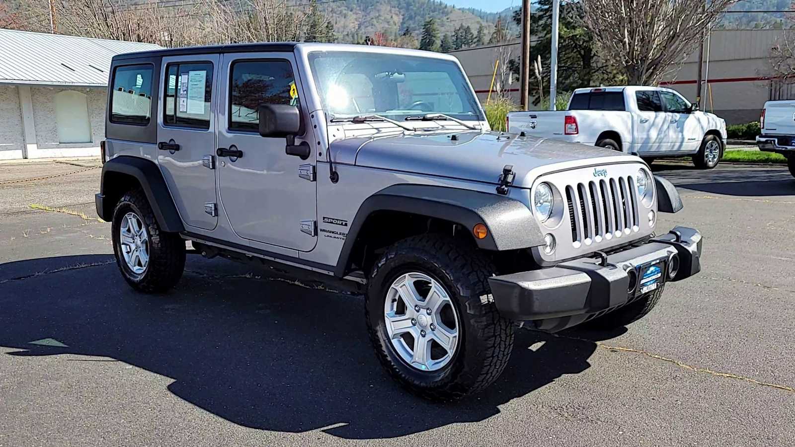 Used 2018 Jeep Wrangler JK Unlimited Sport with VIN 1C4BJWDG1JL868735 for sale in Grants Pass, OR