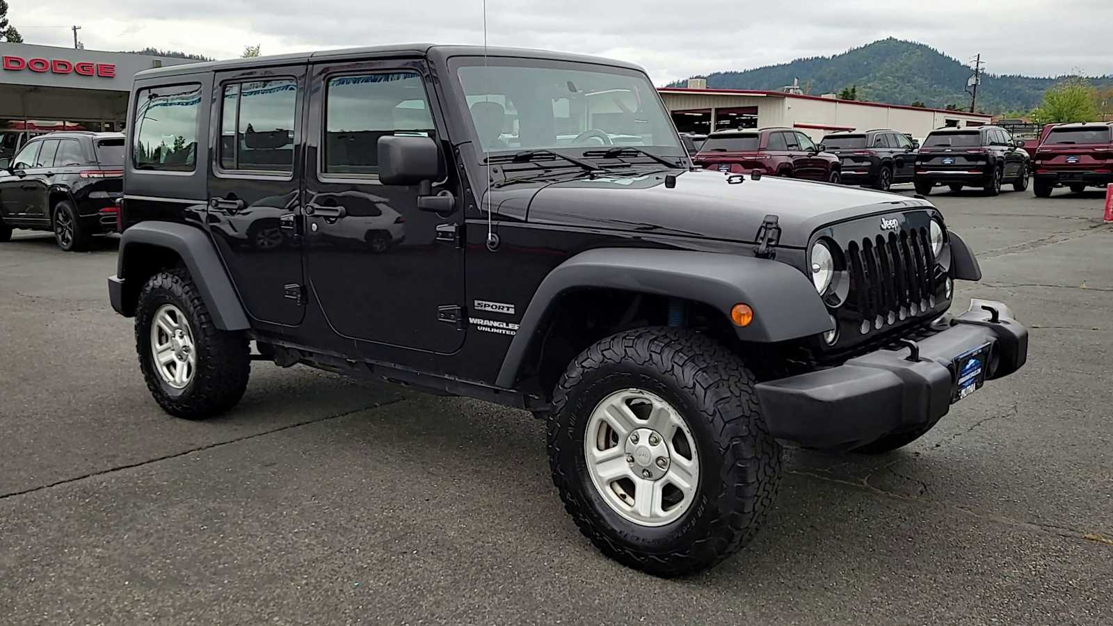 Used 2016 Jeep Wrangler Unlimited Sport with VIN 1C4BJWDG9GL171662 for sale in Grants Pass, OR