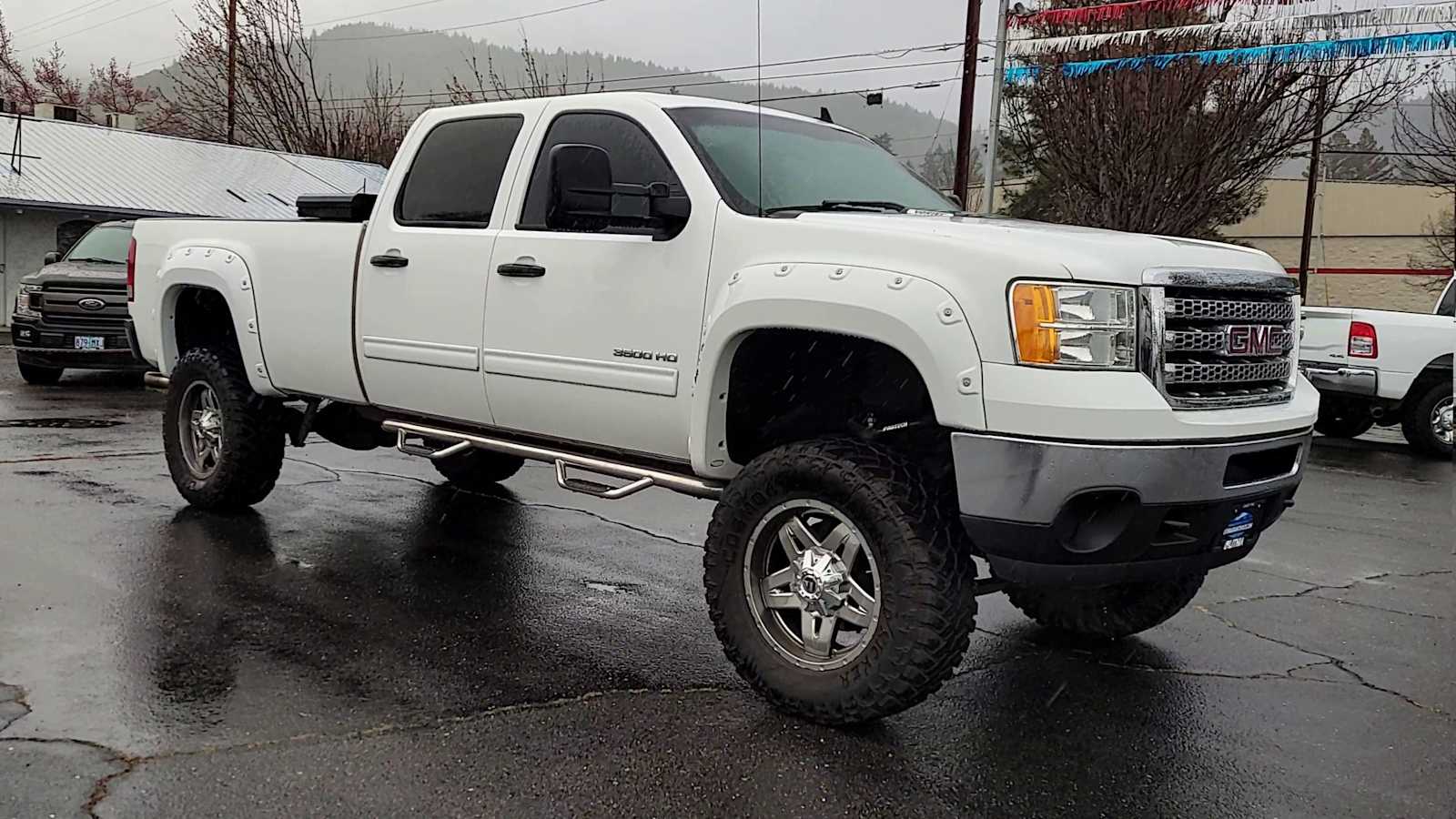 Used 2014 GMC Sierra 3500 SLE with VIN 1GT423EG1EF128173 for sale in Grants Pass, OR