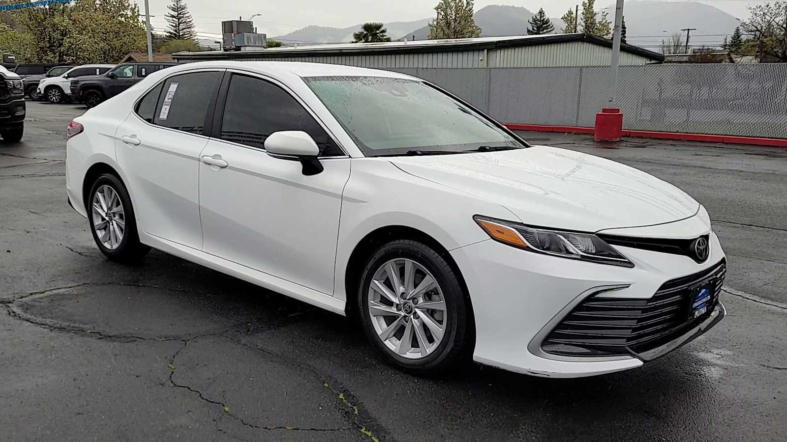 Used 2021 Toyota Camry LE with VIN 4T1C11BK0MU035534 for sale in Grants Pass, OR
