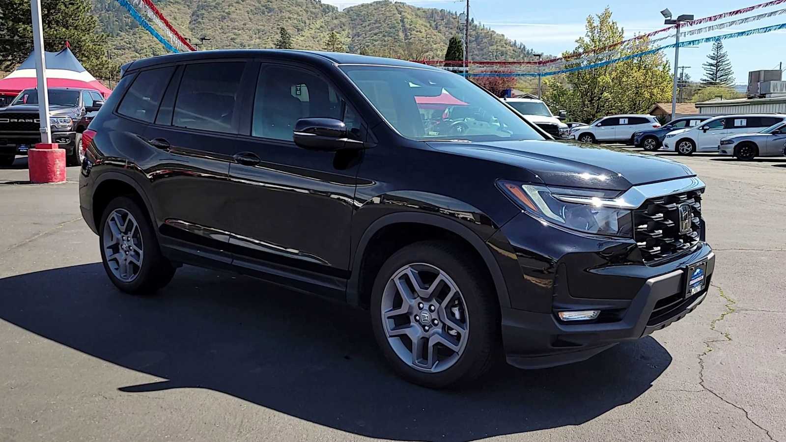 Used 2023 Honda Passport EX-L with VIN 5FNYF8H59PB022641 for sale in Grants Pass, OR