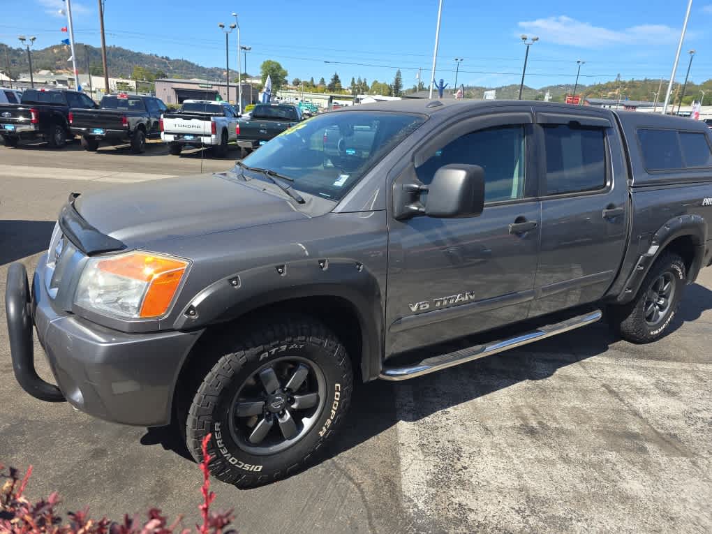 Gray (Gun Metallic) 2013 Nissan Titan Pickup Truck Four-Wheel Drive 5-Speed Automatic