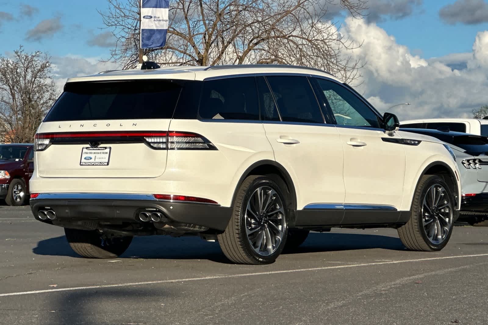 View vehicle photo 2