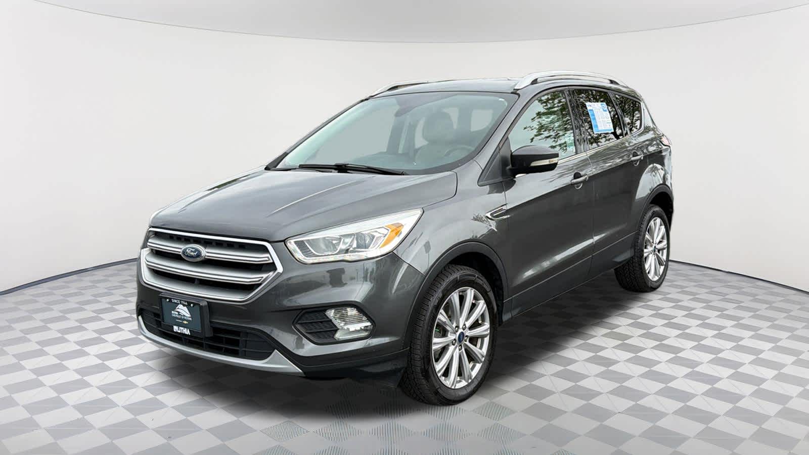 Gray (Magnetic Metallic) 2017 Ford Escape Titanium FWD SUV / Crossover Front-Wheel Drive 6-Speed Automatic