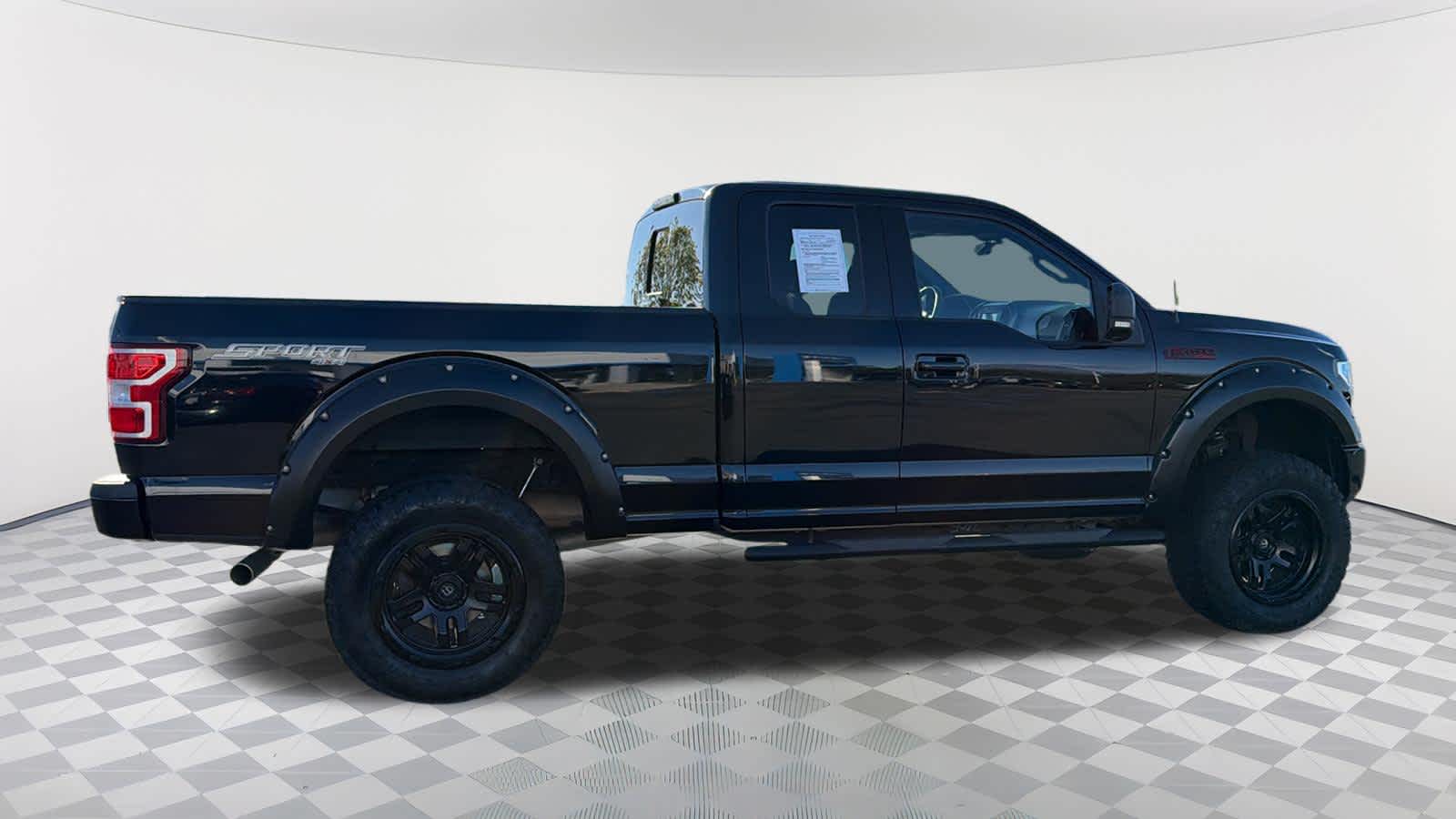 View vehicle photo 4