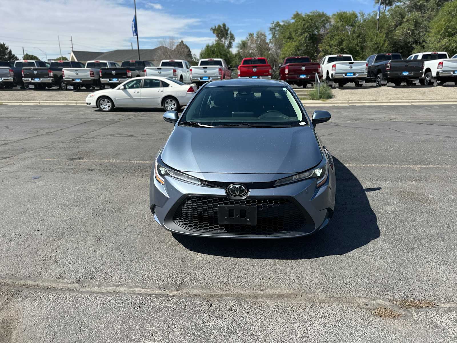 Used 2022 Toyota Corolla LE with VIN 5YFEPMAE2NP321036 for sale in Billings, MT