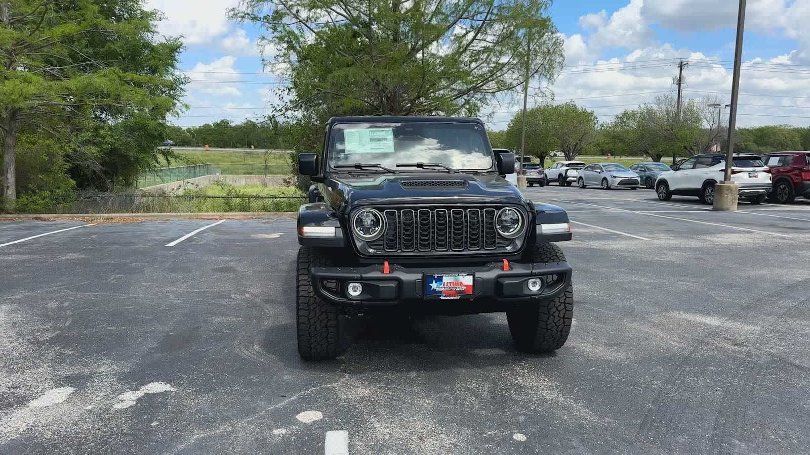 View vehicle photo 3