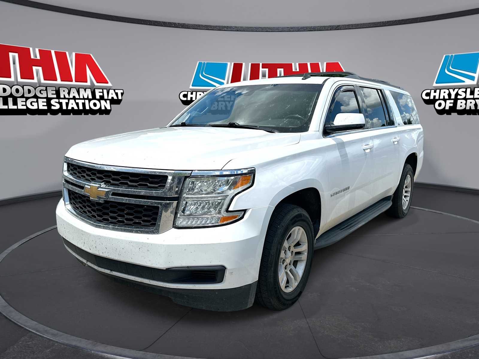 Summit White 2015 Chevrolet Suburban 1500 LS 4WD SUV / Crossover Four-Wheel Drive 6-Speed Automatic