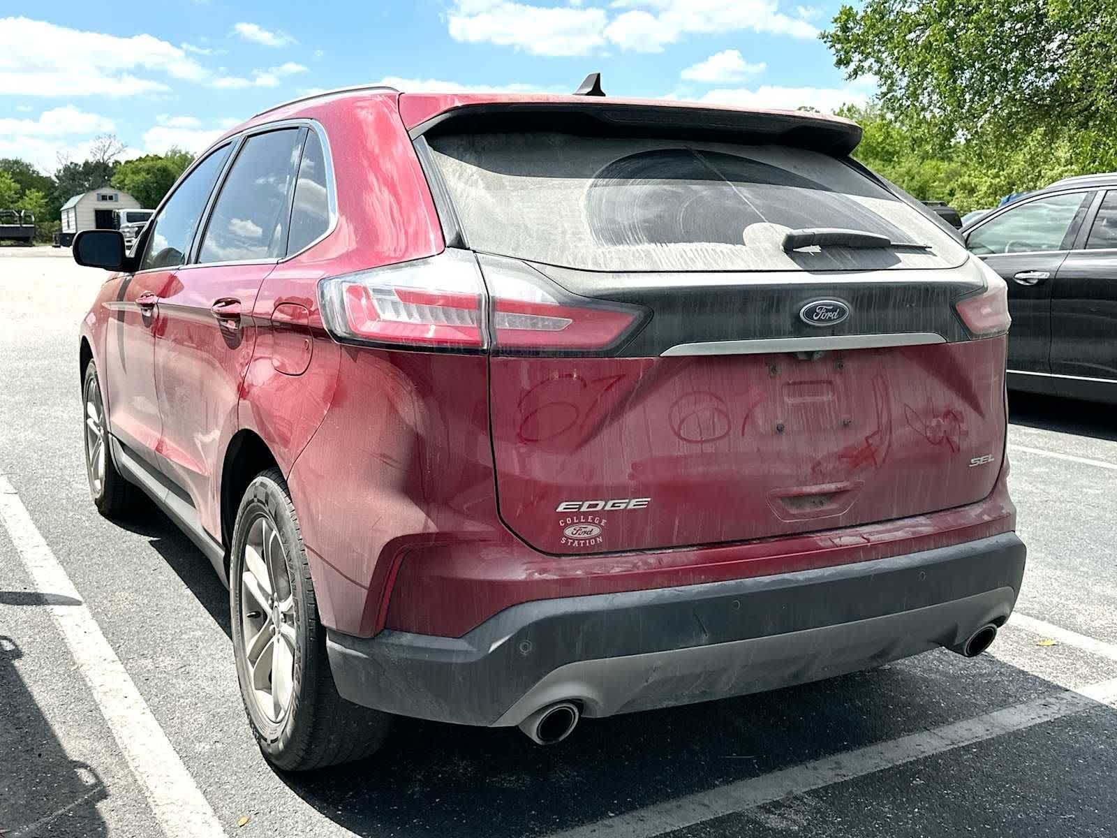 View vehicle photo 3