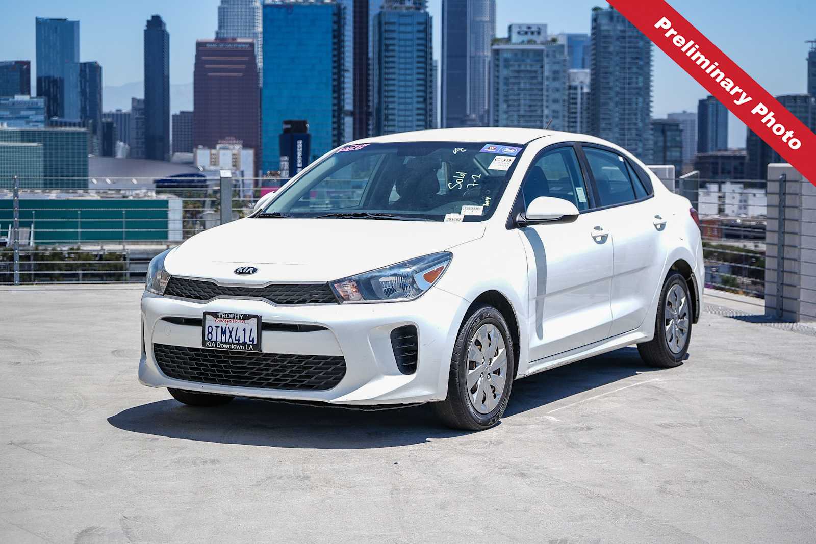 Clear White 2020 Kia Rio Sedan Front-Wheel Drive Continuously Variable Transmission
