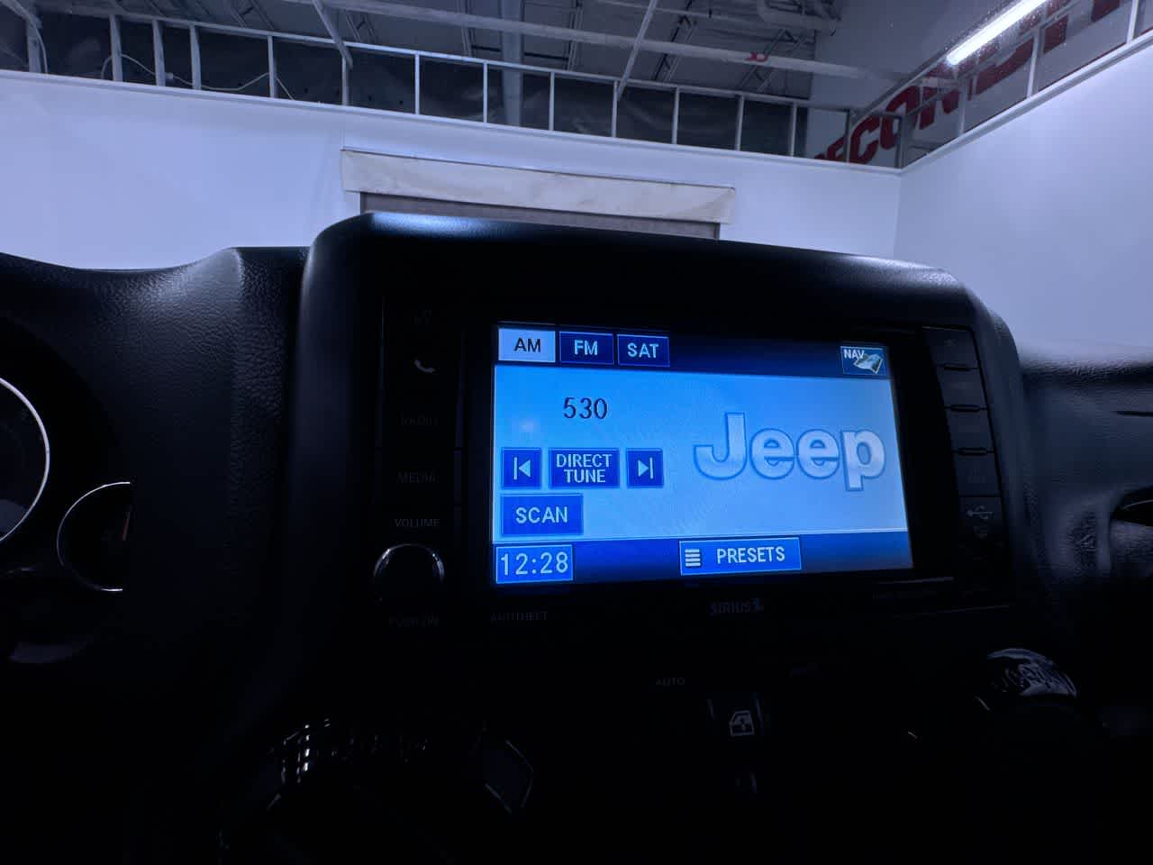used 2012 Jeep Wrangler Unlimited car, priced at $12,777