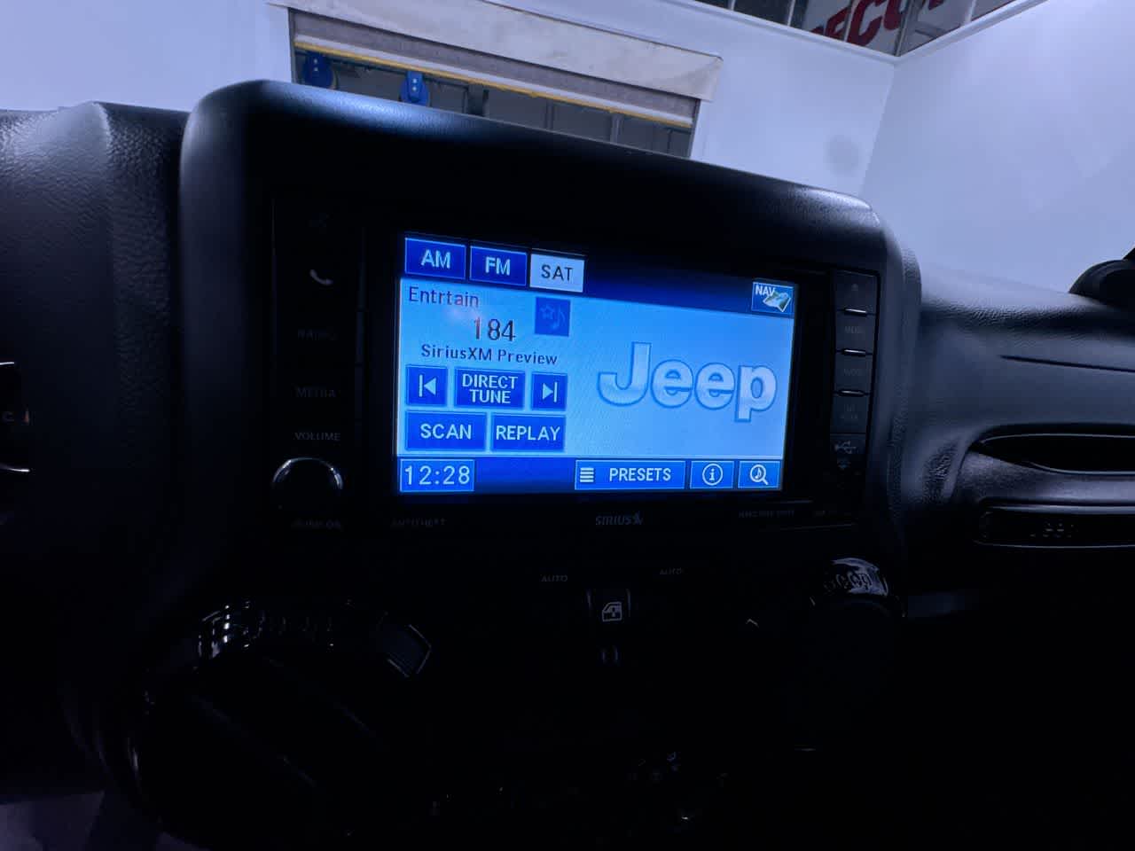 used 2012 Jeep Wrangler Unlimited car, priced at $12,777