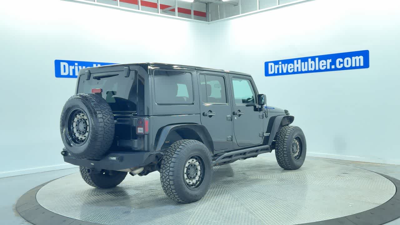used 2012 Jeep Wrangler Unlimited car, priced at $12,777