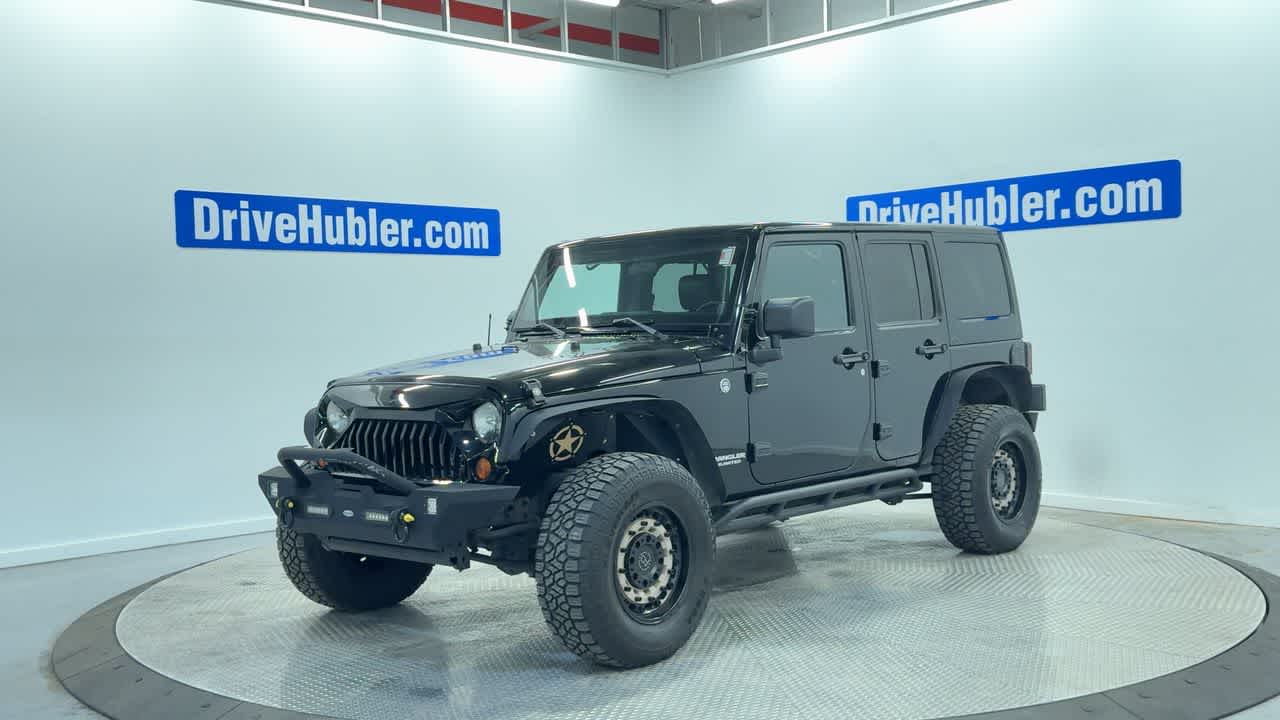 used 2012 Jeep Wrangler Unlimited car, priced at $12,777