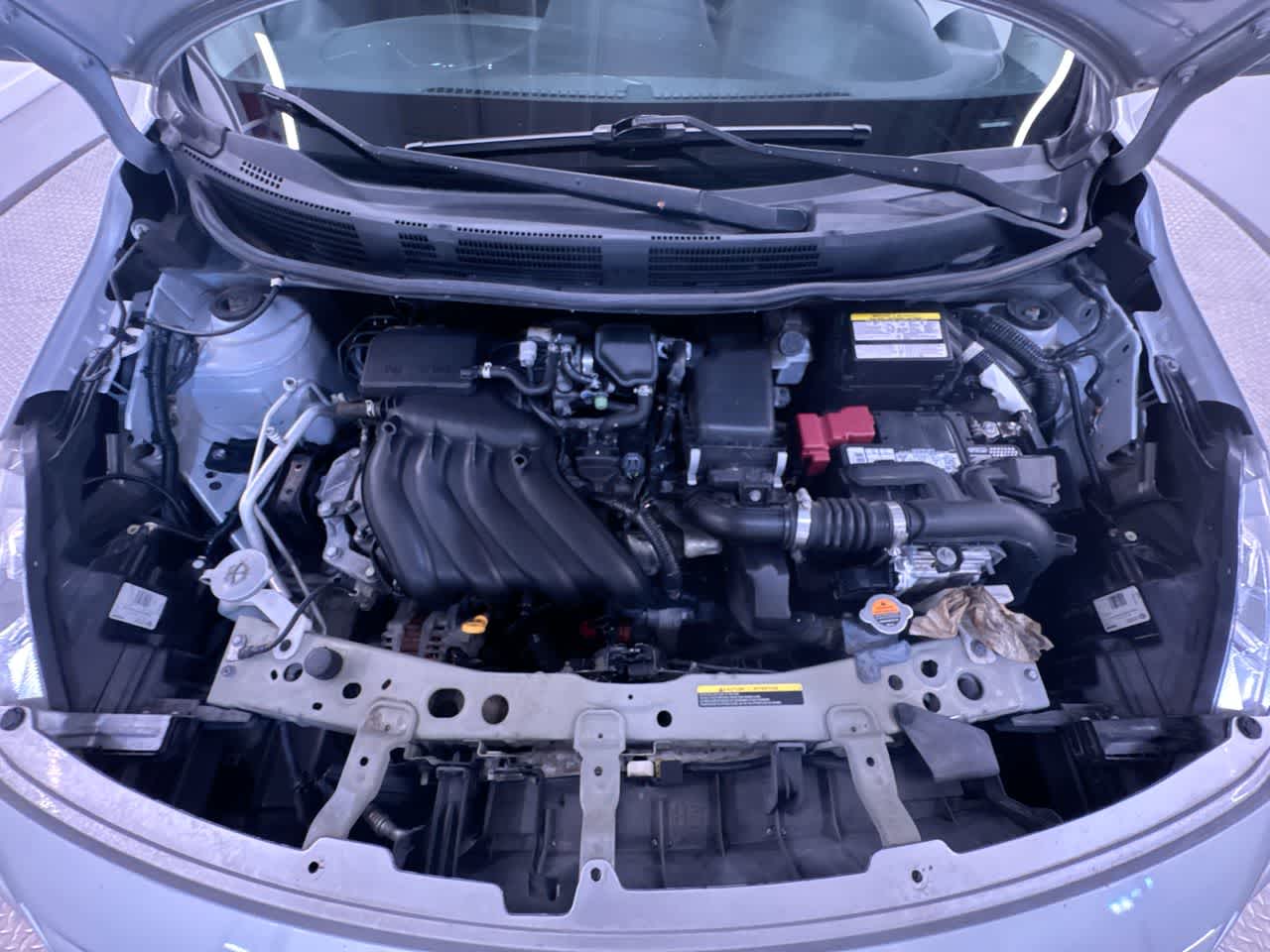 used 2015 Nissan Versa car, priced at $1,500