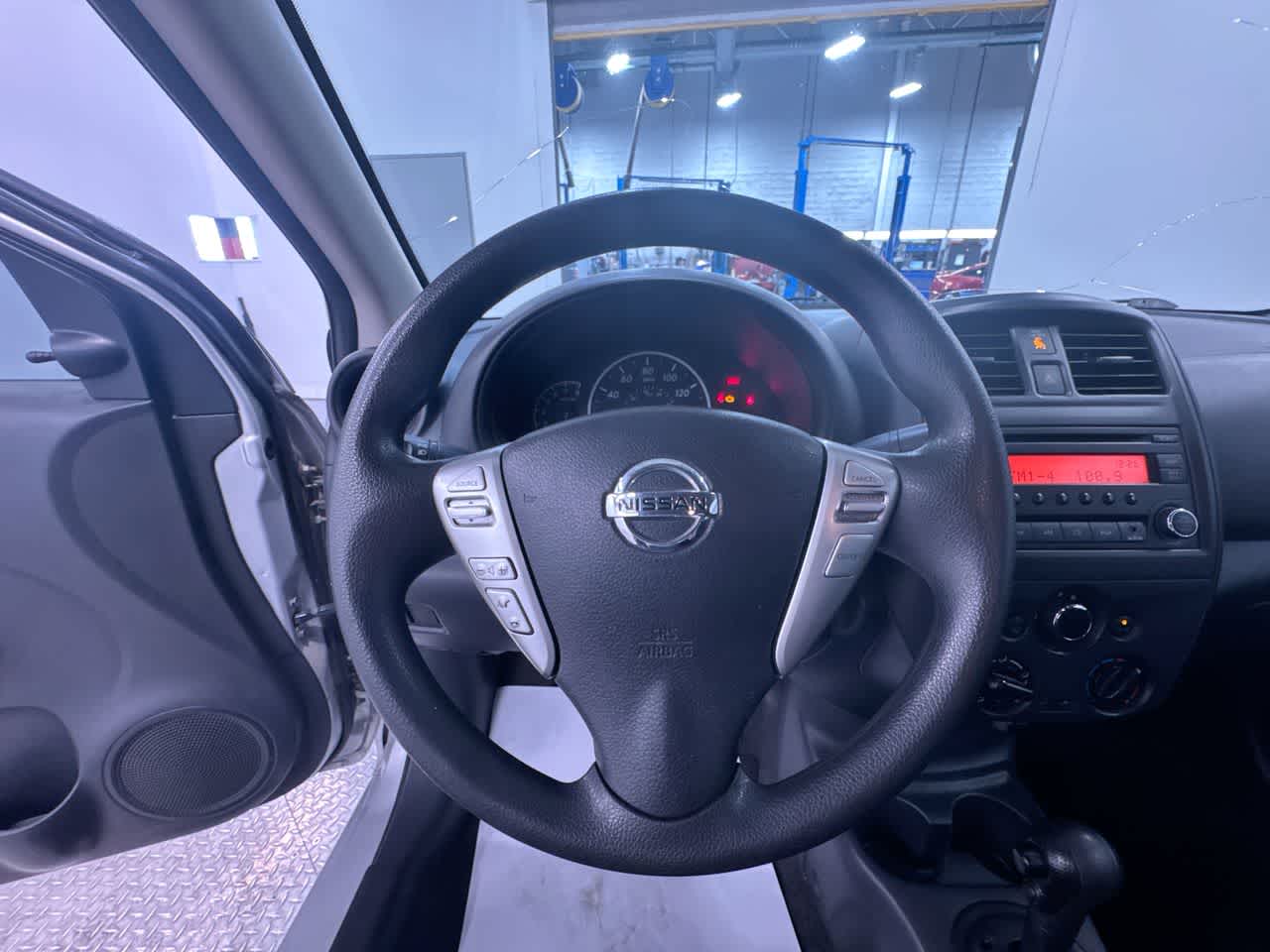 used 2015 Nissan Versa car, priced at $1,500