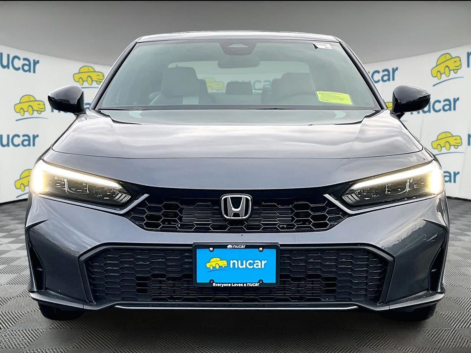 View vehicle photo 3