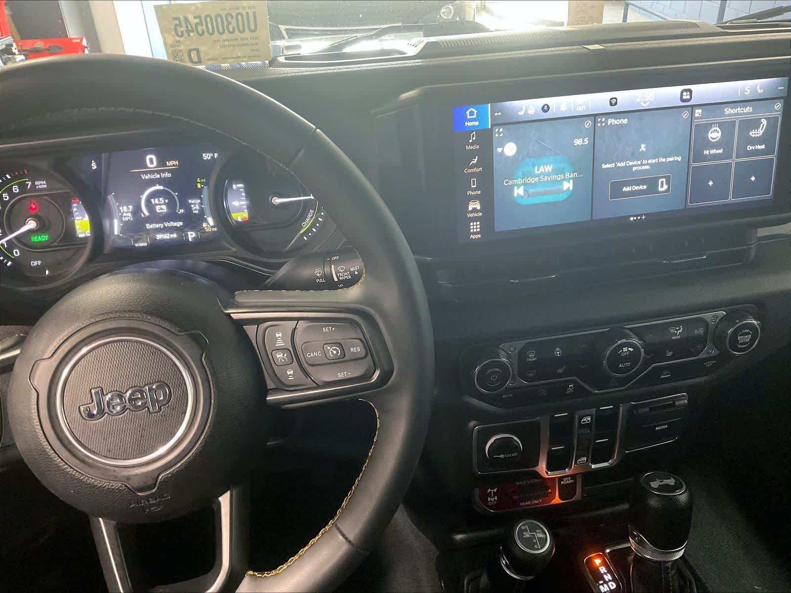 used 2024 Jeep Wrangler 4xe car, priced at $29,557